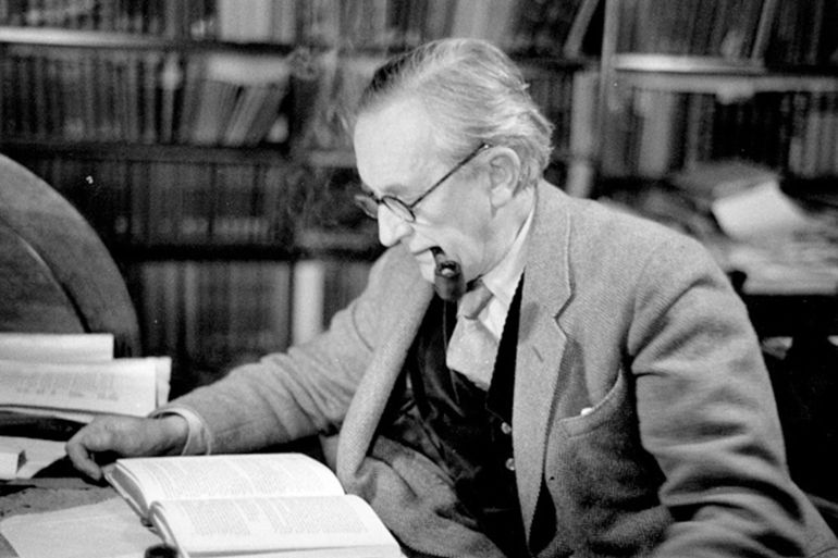 2nd December 1955: John Ronald Reuel Tolkien (1892 - 1973), British writer and professor at Merton College Oxford, reading in his study. Original Publication: Picture Post - 8464 - Professor J R R Tolkien - unpub. (Photo by Haywood Magee/Picture Post/Hulton Archive/Getty Images)